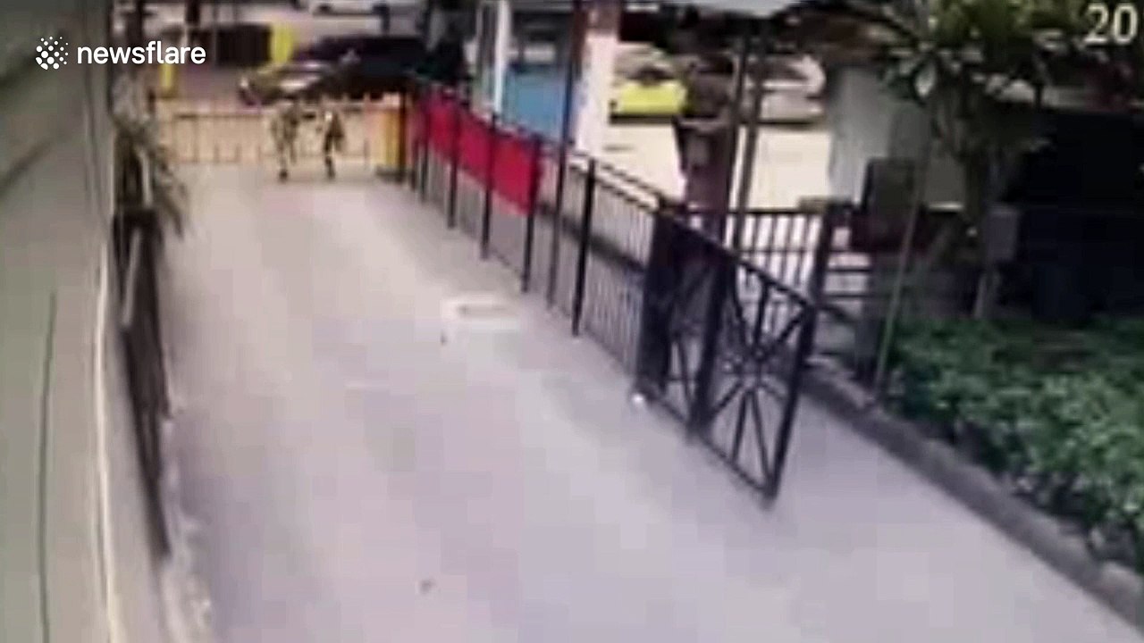 Boy gets head stuck in automatic parking barrier