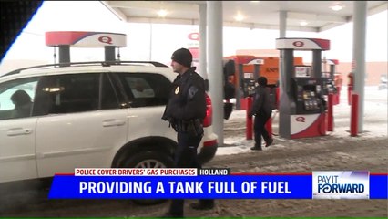 Police Officers Surprise Drivers With Free Gas