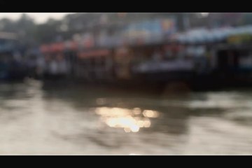 steamer is crossing the ganga river from one side to another side