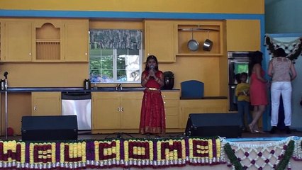 Avantika singing a song at ACF