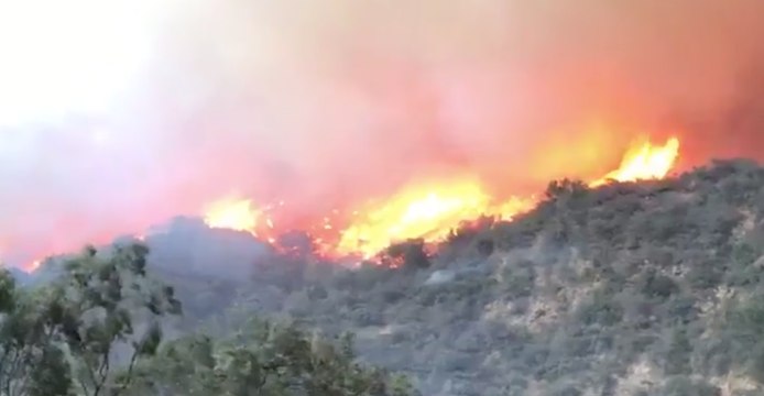 Strong Winds Push Flames Through Montecito Hills