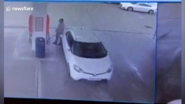 Supercar mounts vehicle at UK petrol station