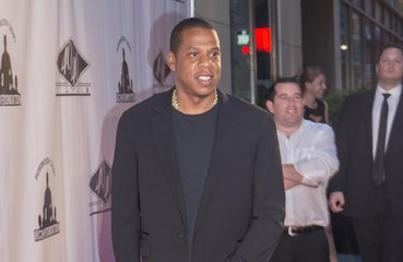 Jay-Z stops show to hug cancer survivor