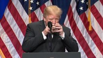Trump drinks water with two hands like a child during big speech on national security