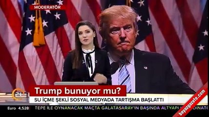 Trump'ın iki eliyle bardağı tutması tartışma yarattı