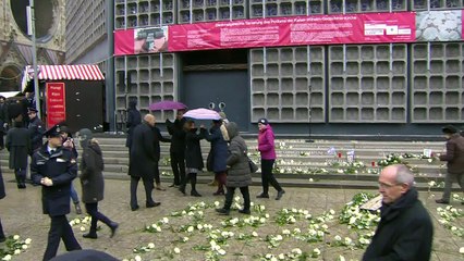 Merkel visits Christmas market a year after the attack