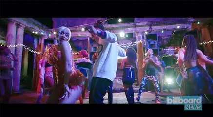 Ozuna & Cardi B Head to Jamaica for Bilingual Rhymes in 'La Modelo' Video I Billboard News