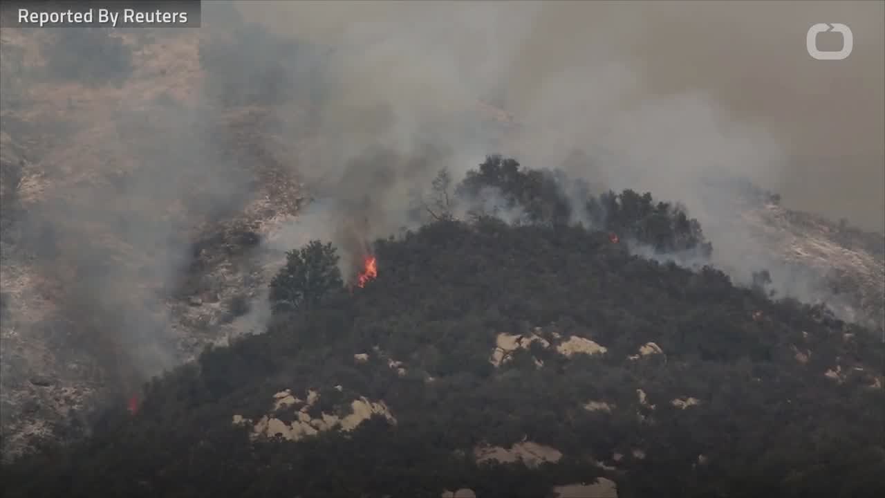 California Firefighters Aided By Strong Winds
