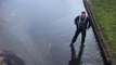 Guy Tries To Cross A Canal Covered By A Thin Layer Of Ice And Exactly What You'd Expect To Happen Happens