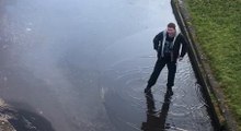 Guy Tries To Cross A Canal Covered By A Thin Layer Of Ice And Exactly What You'd Expect To Happen Happens