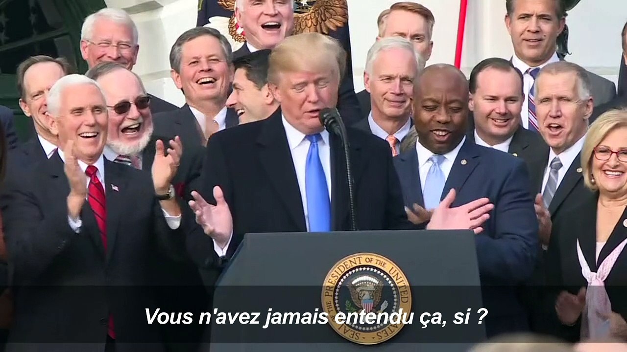 Promesse tenue: Trump célèbre l'adoption de la baisse des impôts
