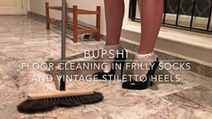 Floor cleaning in frilly socks and vintage stiletto heels