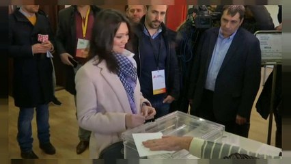 Former Catalan president votes from self-imposed exile