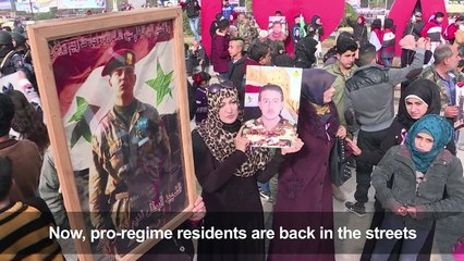 Thousands in Syria's Aleppo mark one year since 'victory'