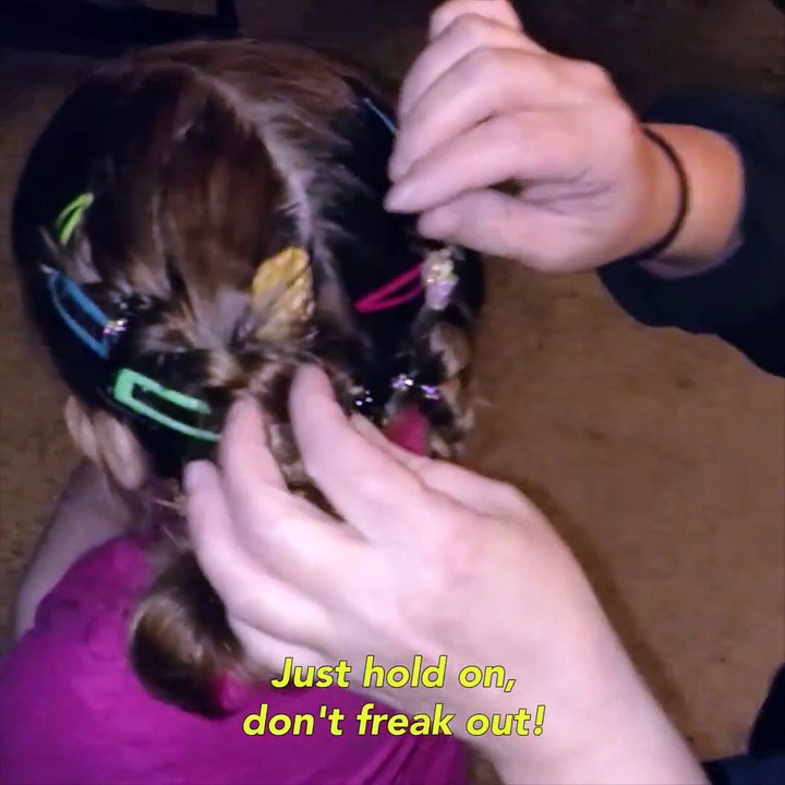 Lizard in the girl's hair