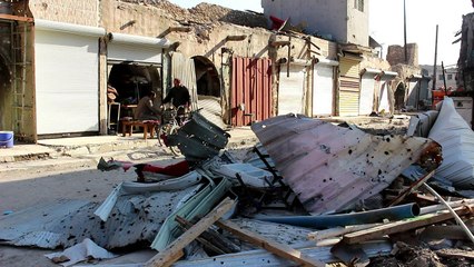Irak:sans aide, des commerçants reconstruisent eux-mêmes Mossoul
