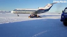 Russian Post Plane Scatters Presents In Snow