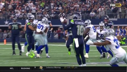 Russell Wilson throws a dart under pressure on third-and-8