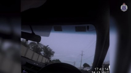 Police Chase Mysterious Man in Red During Break and Enter on Christmas Eve