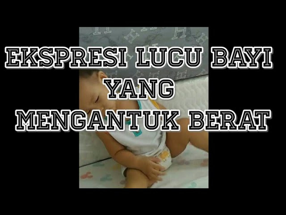 Ekspresi lucu bayi yang mengantuk