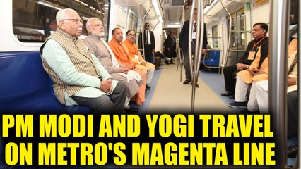 Download Video: PM Modi and UP CM Yogi Adityanath travel on DMRC's Magenta line, Watch | Oneindia News