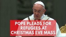 Pope Francis pleads for migrants 'driven from their land' at Christmas Eve Mass