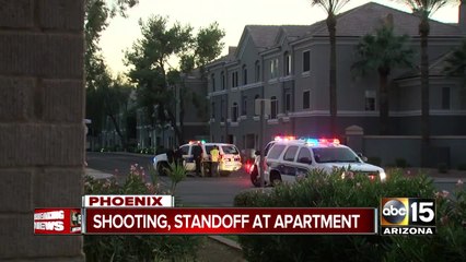 Barricade standoff in Phoenix after man shoots woman