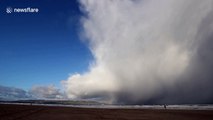 Huge winter storm cell over Northern Ireland beach