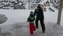 Father and daughter bellyflop into 4ft of snow in Erie, Pennsylvania