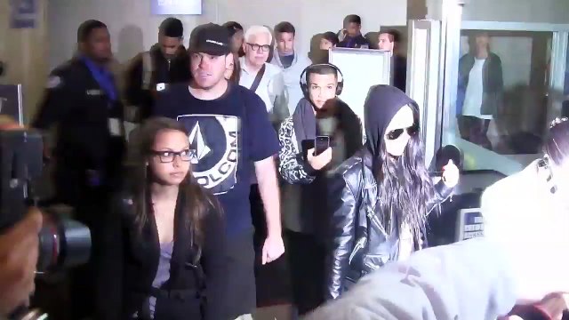 Paparazzi Chaos Surrounds Kim Kardashian When She Arrives At LAX [2014]