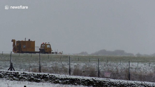 Snow ploughs clear Leeds Bradford Airport