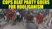 New year 2018 : Police beat miscreants outside Sahara Mall in Gurugram, Watch | Oneindia News