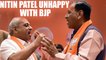Gujarat Deputy Chief Minister Nitin Patel upset after being stripped off key portfolios | Oneindia