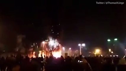 Missiles are thrown through the air during protest in iran