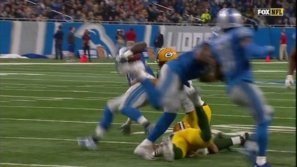 Glover Quin punches the ball from Brett Hundley to force fumble