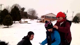Jamie and Damien playing in snow
