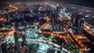 Aerial View of Dubai Downtown Skyscrapers and Highways with Light Trails by Timelapse4K