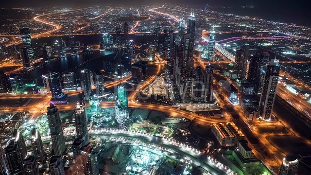 Aerial View of Dubai Downtown Skyscrapers and Highways with Light Trails by Timelapse4K
