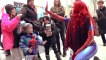 Spider-Man  SPIDER-VERSE CHRISTMAS FLASH MOB!!! Giving Gifts Prank | Superheroes | Spiderman | Superman | Frozen Elsa | Joker