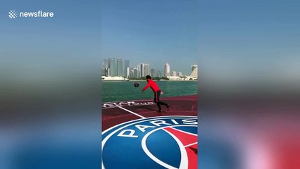 Neymar Jr accidentally boots his shoe into the sea during PR stunt
