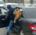 Russian man filmed pushing his pet lion in the back of car
