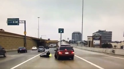 Download Video: Texas Police Officer Narrowly Avoids Being Hit by Sliding Car on Icy Road