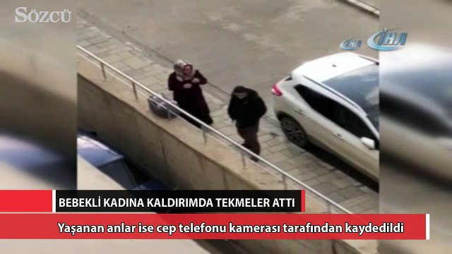 Bebekli kadına kaldırımda tekmeler attı