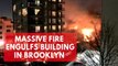 Massive fire engulfs residential building in New York