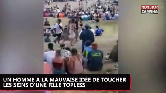 Un homme a la mauvaise idée de toucher les seins d'une fille topless (vidéo)