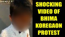 Bhima Koregaon protest : Viral video of kid carrying stones, Watch Video | Oneindia News