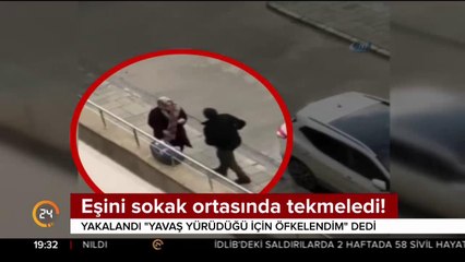 Eşini sokak ortasında tekmeledi!