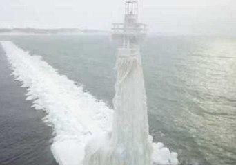 Drone Takes Tour of Frozen Lighthouses on Lake Michigan