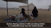 Displaced Syrians take shelter in a makeshift camp
