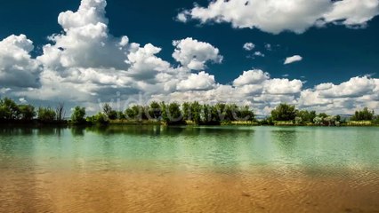 Clouds Reflected In a Lake Sairam-Su, Tian-Shan, Kazahkstan by Timelapse4K